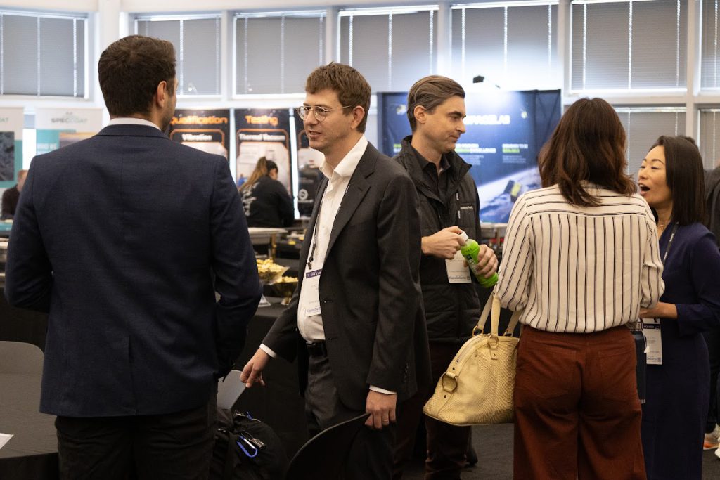 Group conversation on the exhibit floor at SVSW